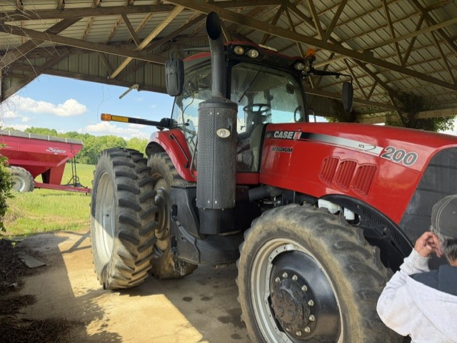 John Deere row crop tractor with cab